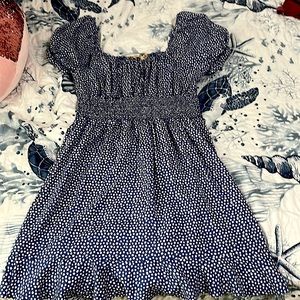 This is a blue pockadot dress